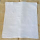 Set of 12 hand-embroidered cotton damask napkins