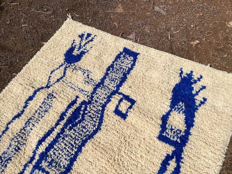 Handmade Moroccan Azilal rug in blue and white, 150/250 cm.