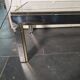 Chrome and gold metal coffee table by Romeo Rega from the 1970s.
