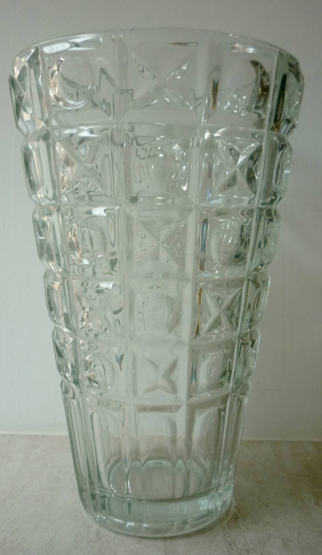 Transparent glass vase with art deco geometric patterns
