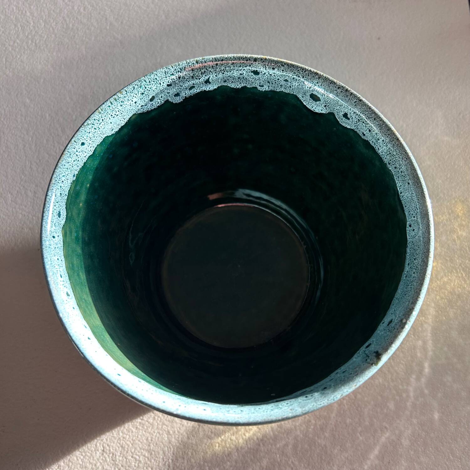 Green flowerpot with foam edging