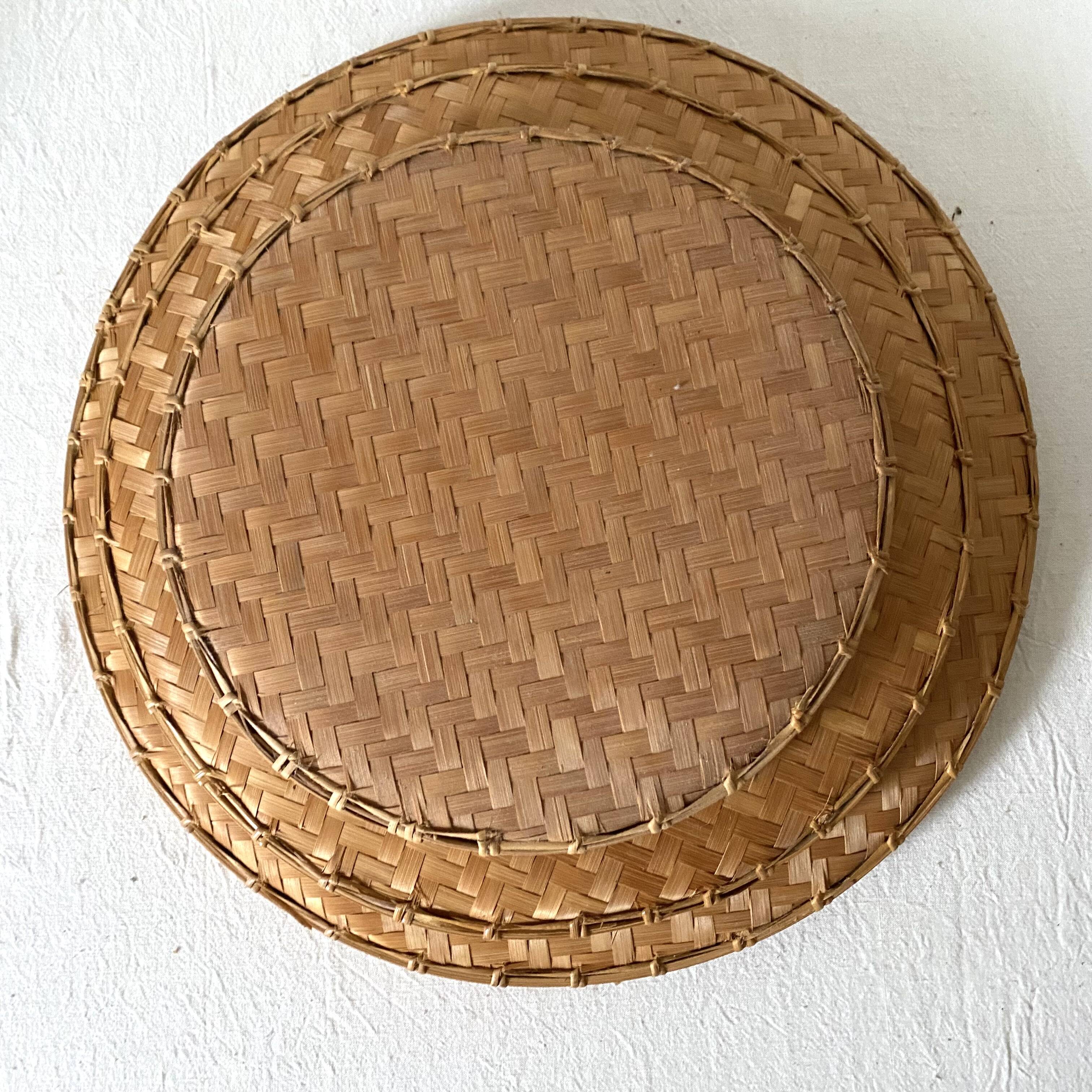 Round nesting trays in woven bamboo