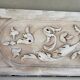 Paire de panneaux en bois sculpté