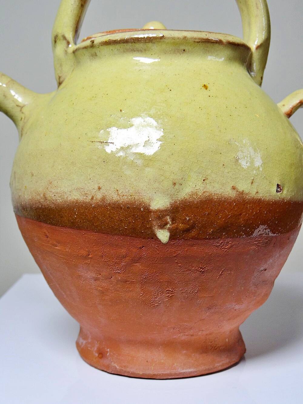 Small vintage pale yellow enamelled terracotta goat jug