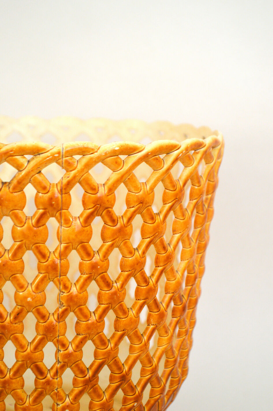 Orange openwork pot cover