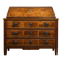 Commode scribanne from the Louis XVI period in walnut burl with marquetry decoration.