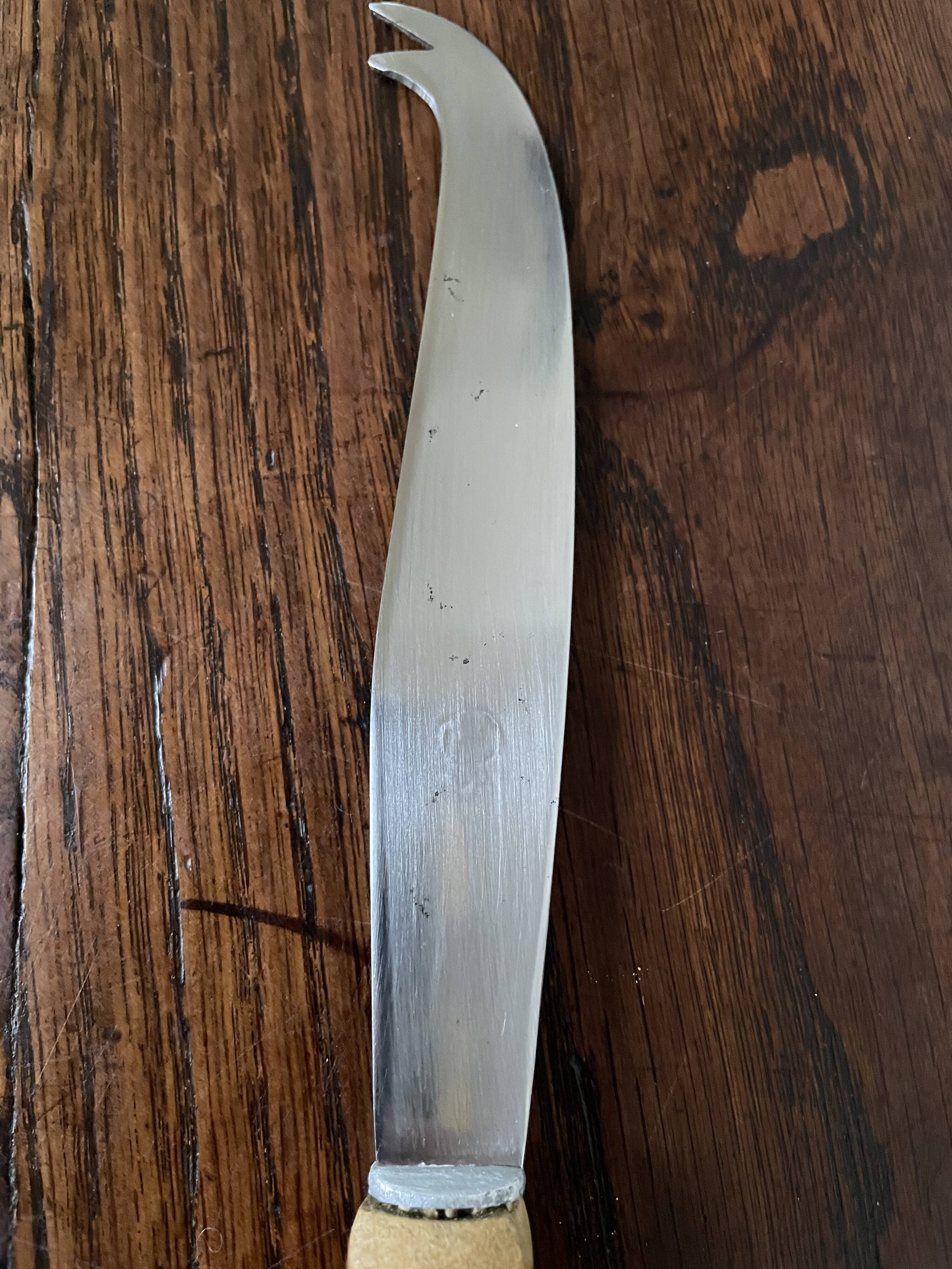 Bamboo handle cheese knife