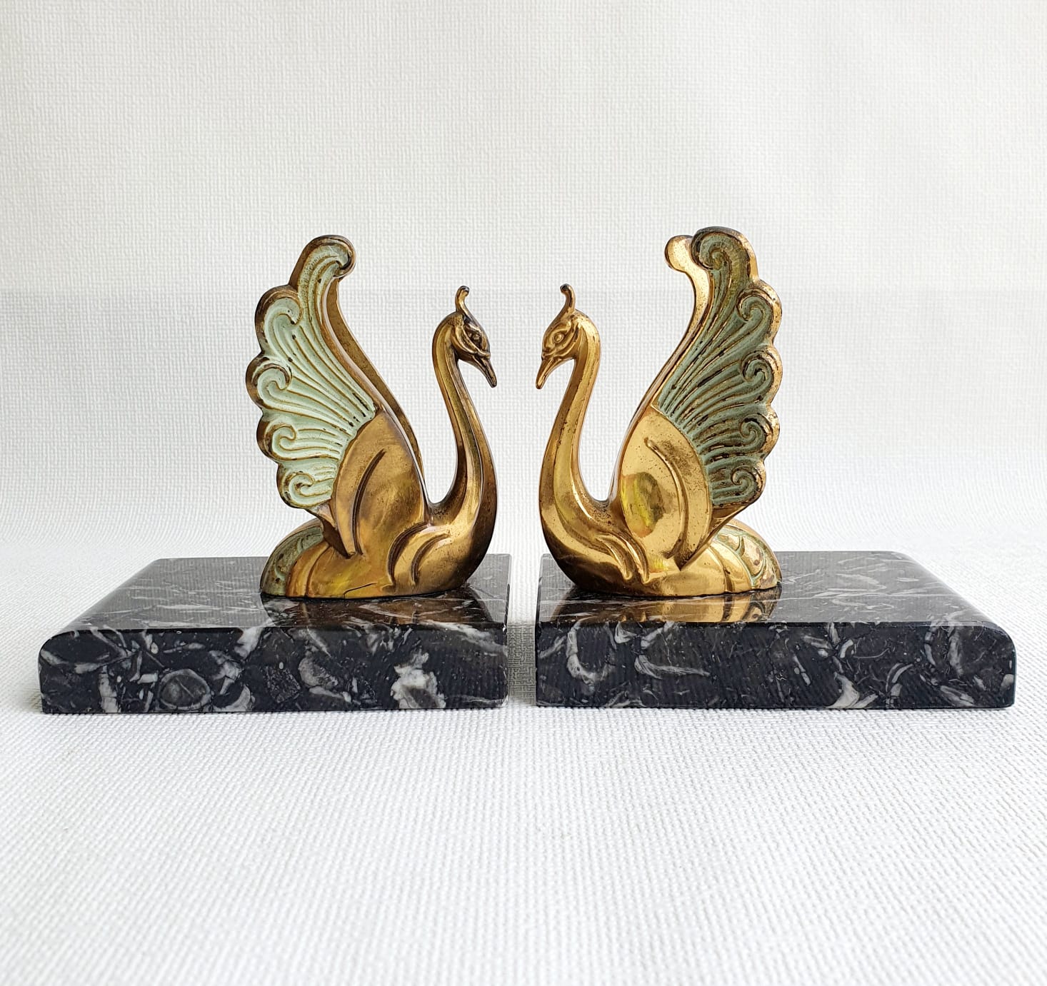 Book-clamps swans art deco