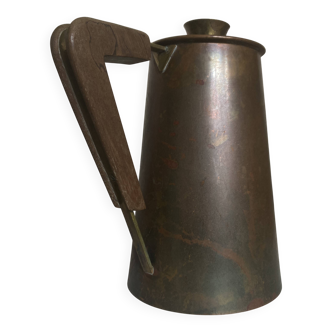 Modernist Italian pitcher design from the 1960s in patinated wood and metal.