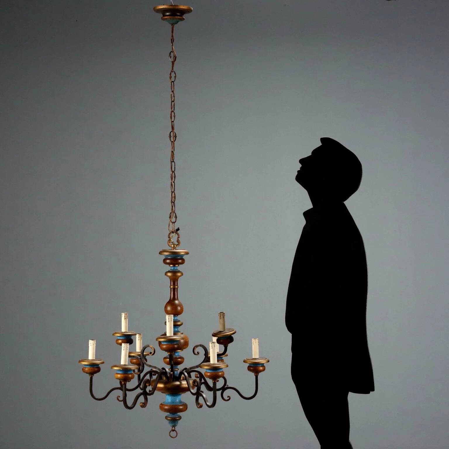 Antique wooden and brass chandelier with 9 lights, Italy, 20th century.