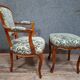 Cabriolet armchair in cherry wood with its footrest, 20th century.