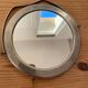 Vintage round mirror in silvered metal.