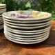 Service 10 plates and 14 sub-plates St Clement