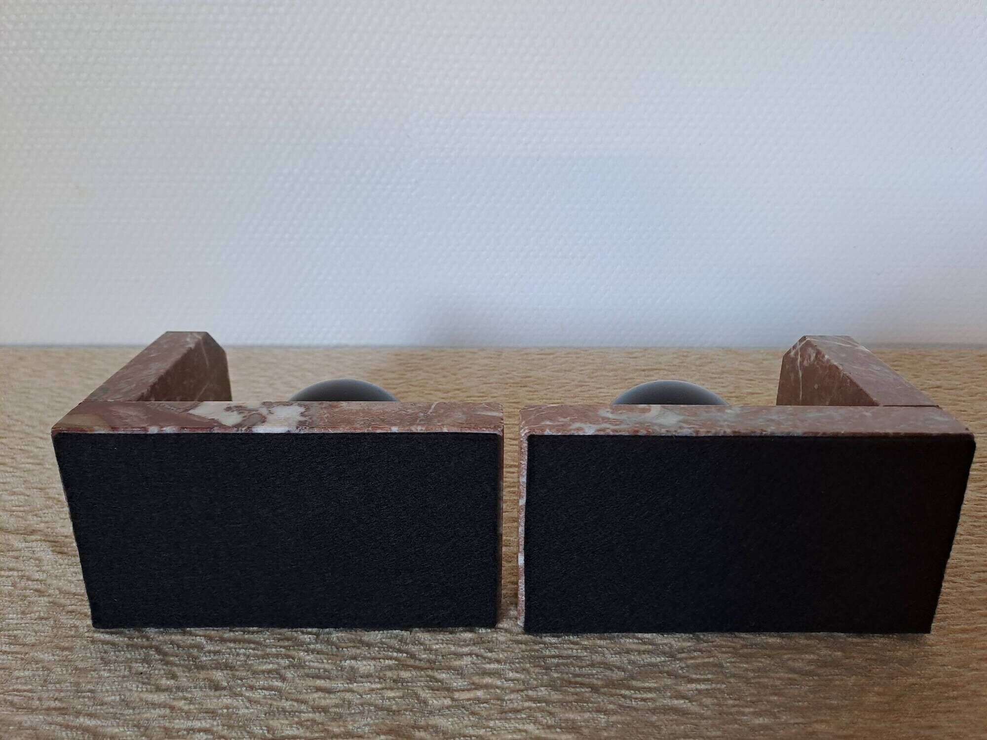 Pair of red marble bookends with black stone spheres – Art Style