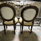 pretty pair of Louis XVI style chairs, in carved and gilded wood