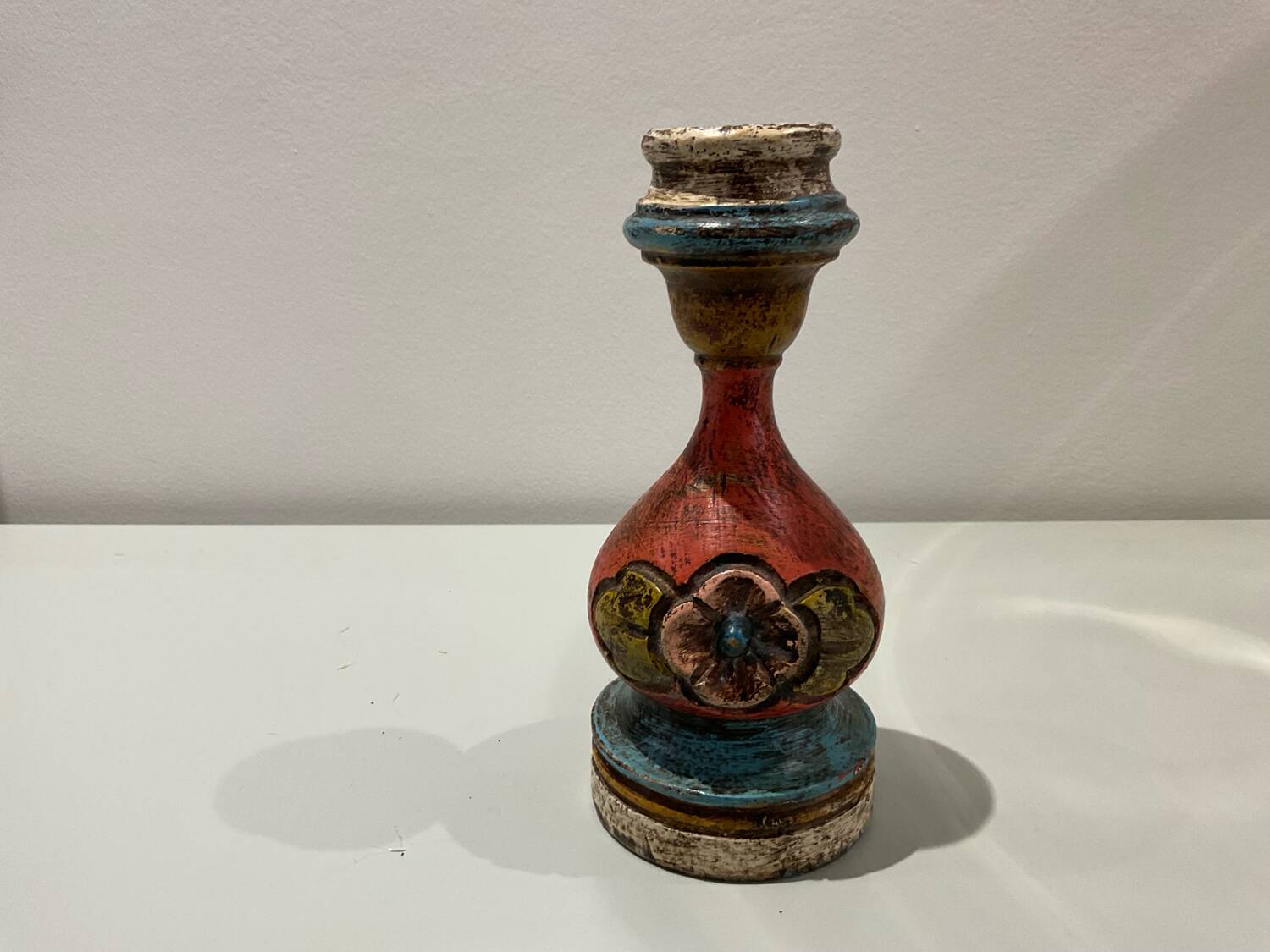 Painted wooden candle holder