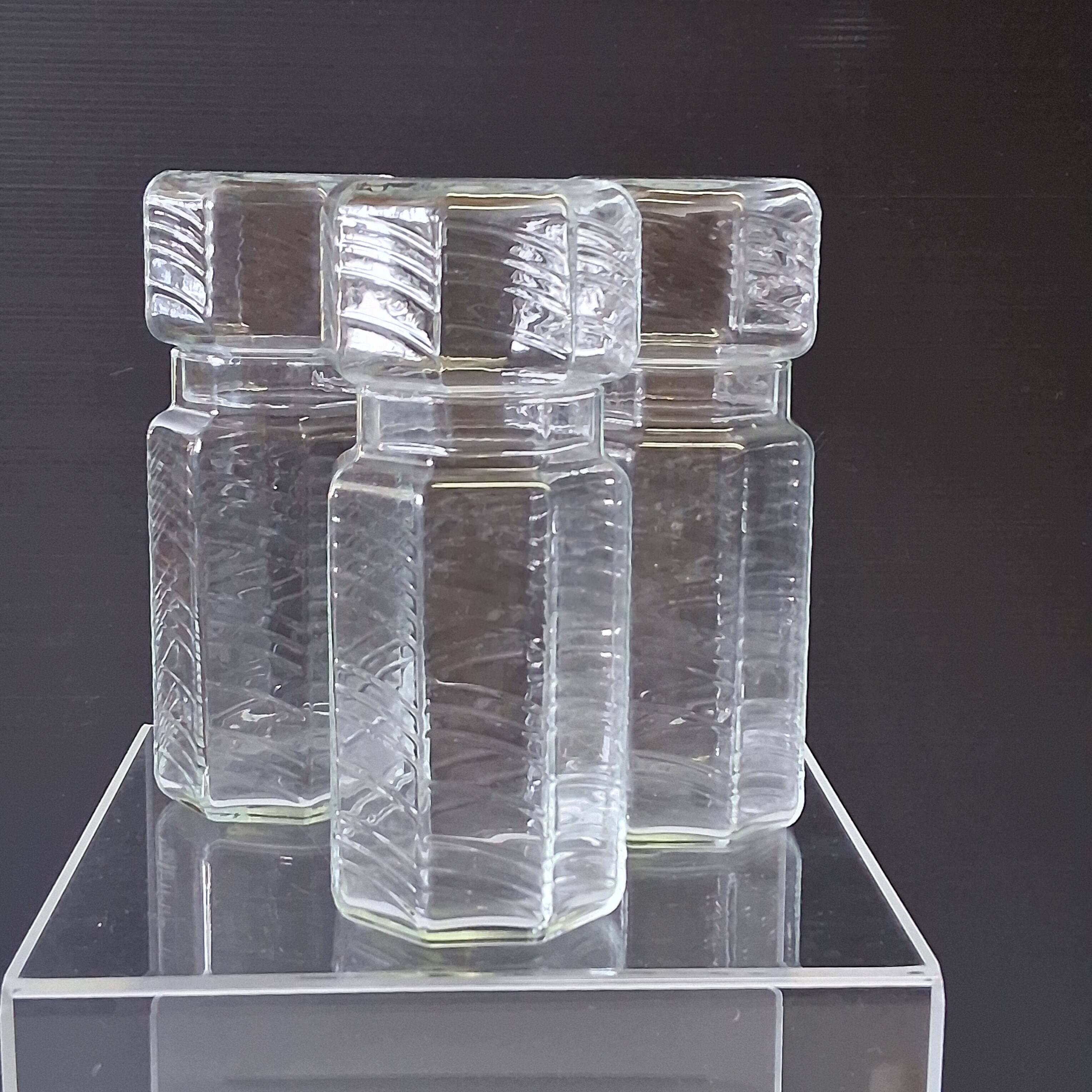 Set of 3 glass jars with old transparent lids in very good condition.
