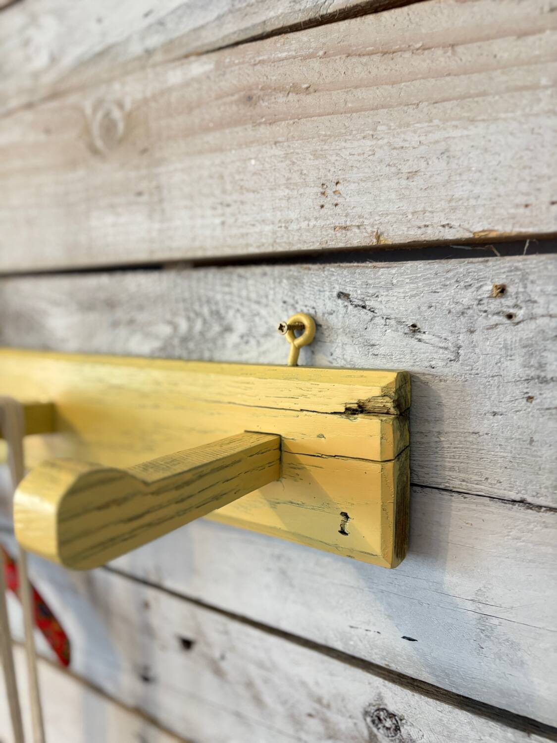 Antique lemon yellow coat hook