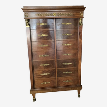 Empire style mahogany weekly decorated with two caryatids and bronze lion legs