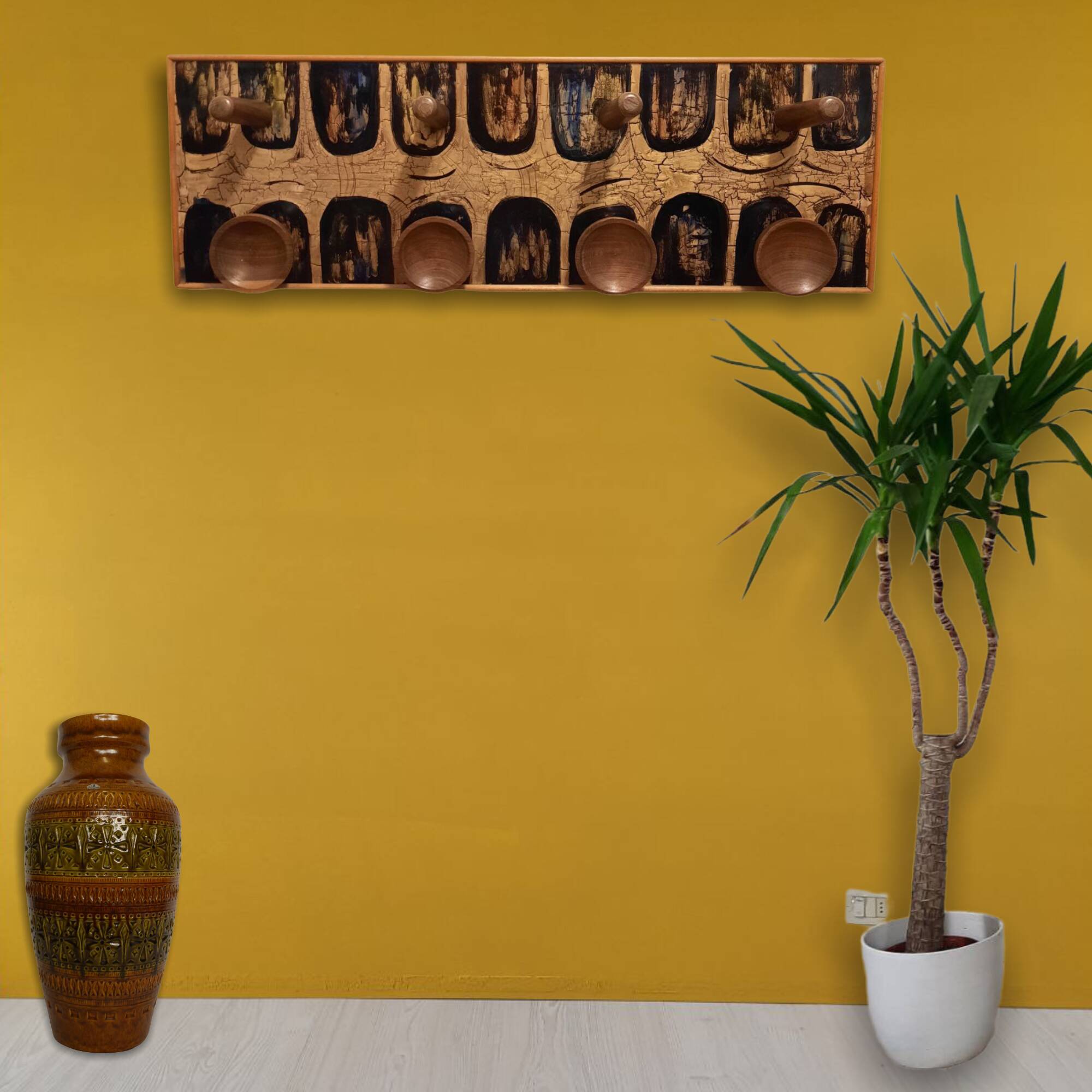 Vintage wooden coat hangers and glazed copper