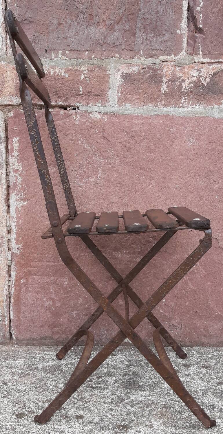 Foldable wrought iron chair
