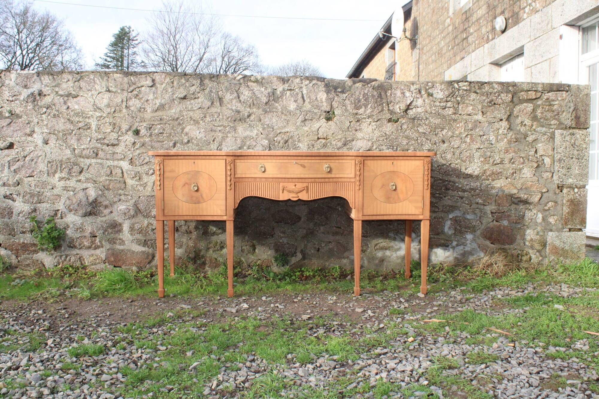 English-made enfilade in Louis XVI style with light wood veneers.
