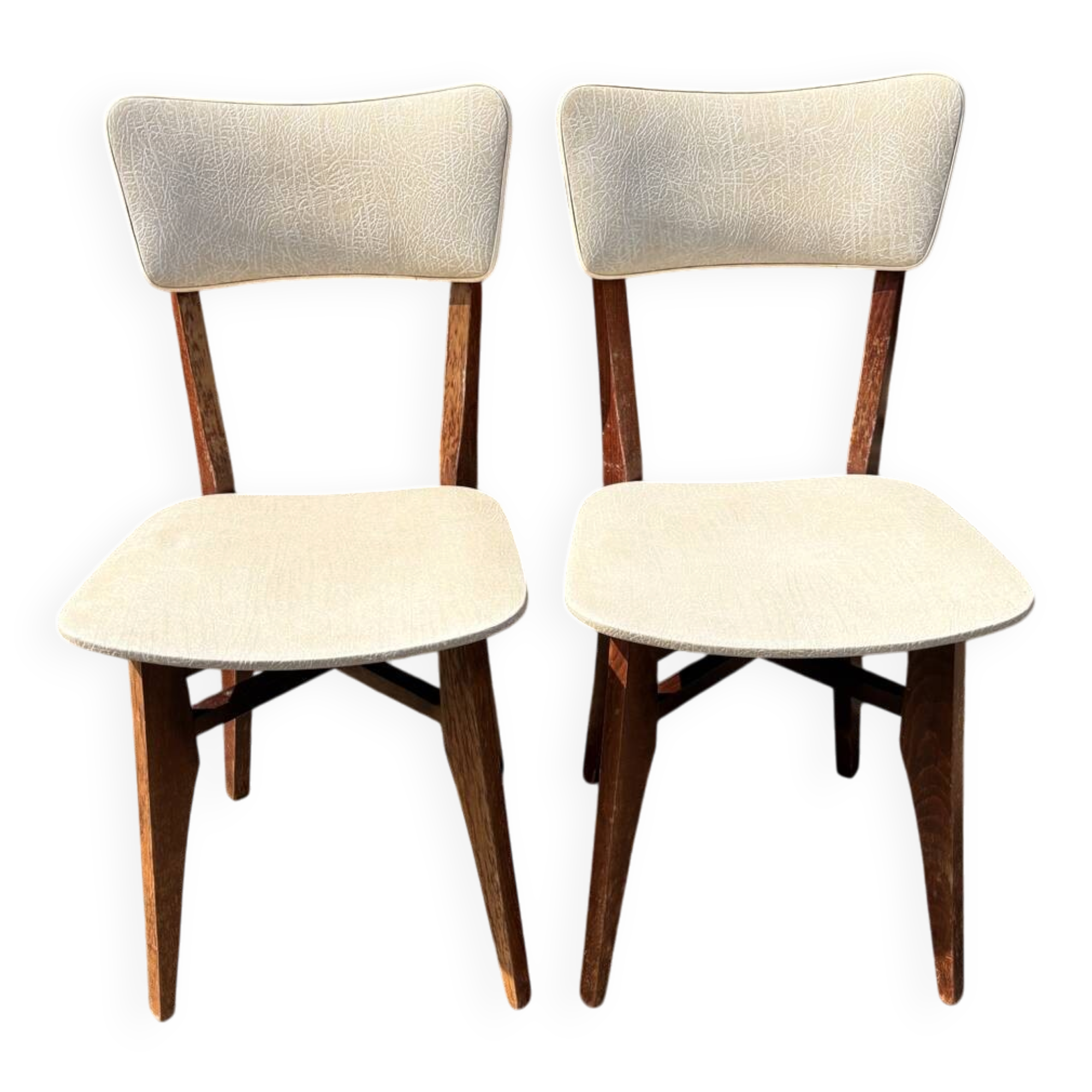 Pair of vintage chairs with upholstered backrest and seat, 1950s style.