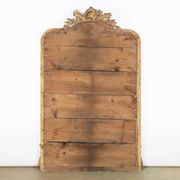 Miroir en bois doré de style néo-classique à motif corde et pompons