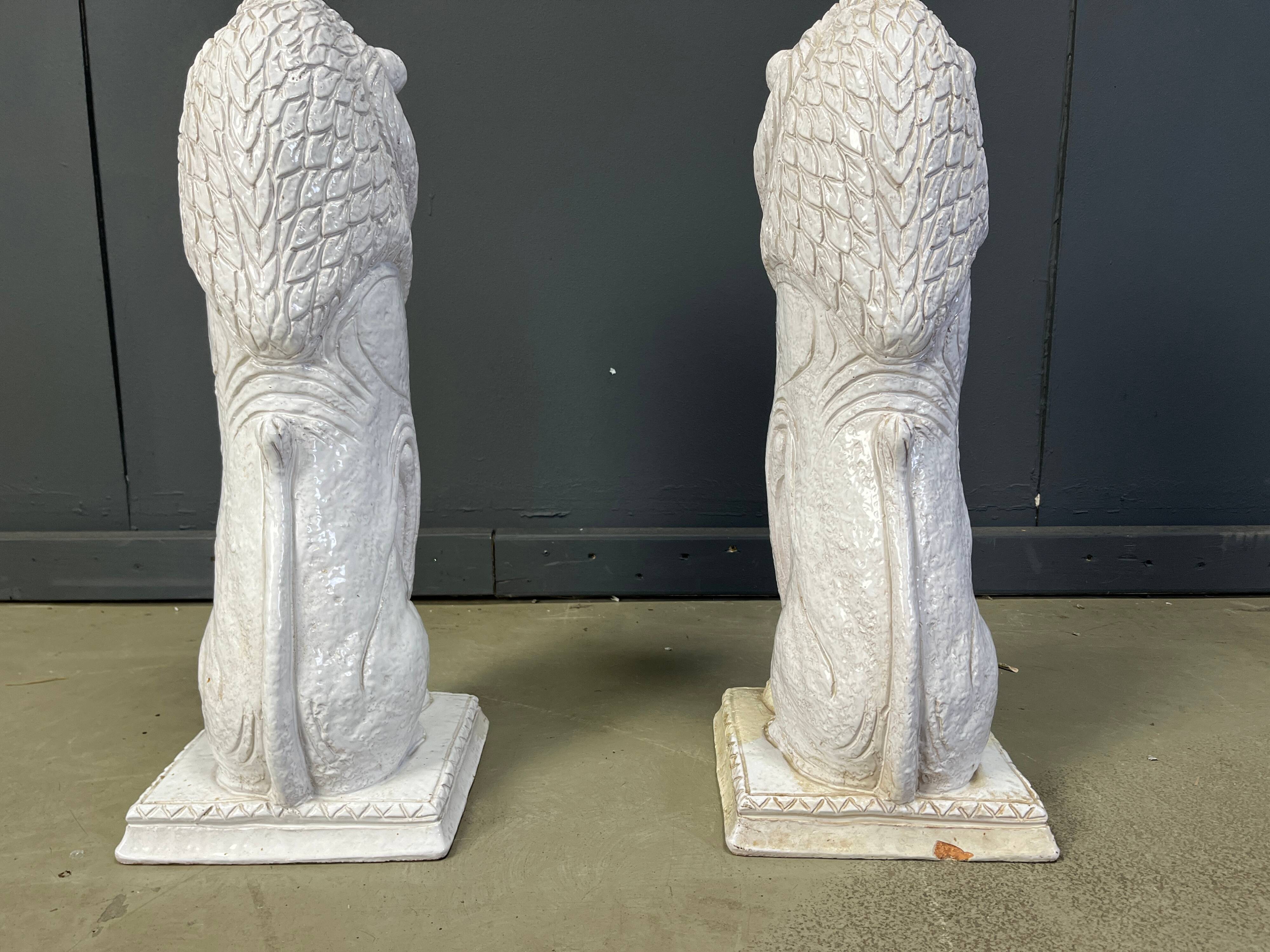 Pair of Renaissance style terracotta lion sculptures, 1950s
