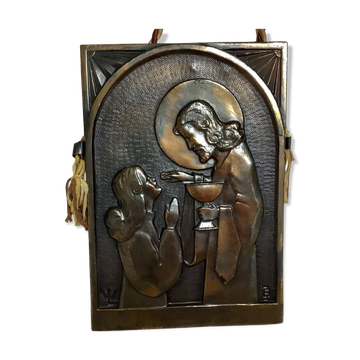 Bas-relief of communion religious object