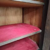 Bonnetière man standing cabinet a door