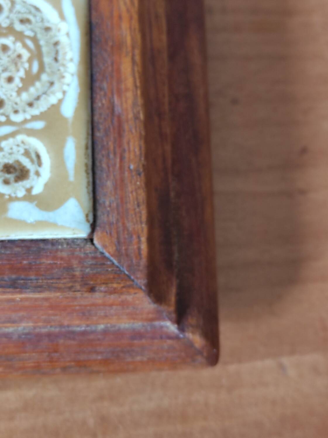 Wooden and ceramic trivet