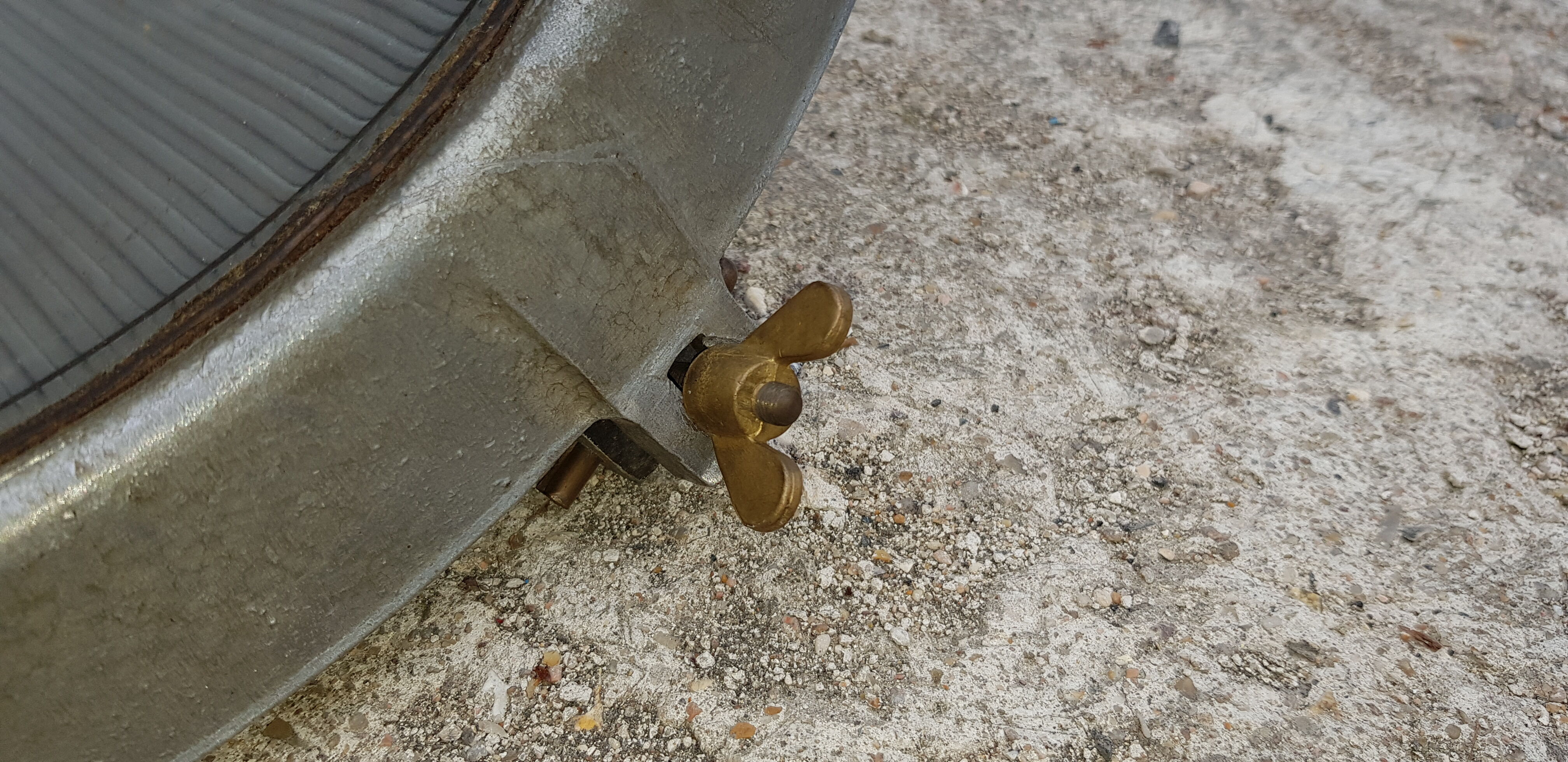 Old brass boat headlight with Holophane interior glass