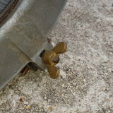 Old brass boat headlight with Holophane interior glass