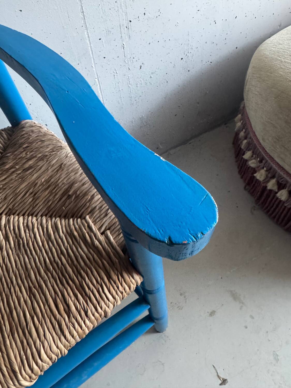 Pair of Provençal armchairs in painted wood and straw, around 1960.