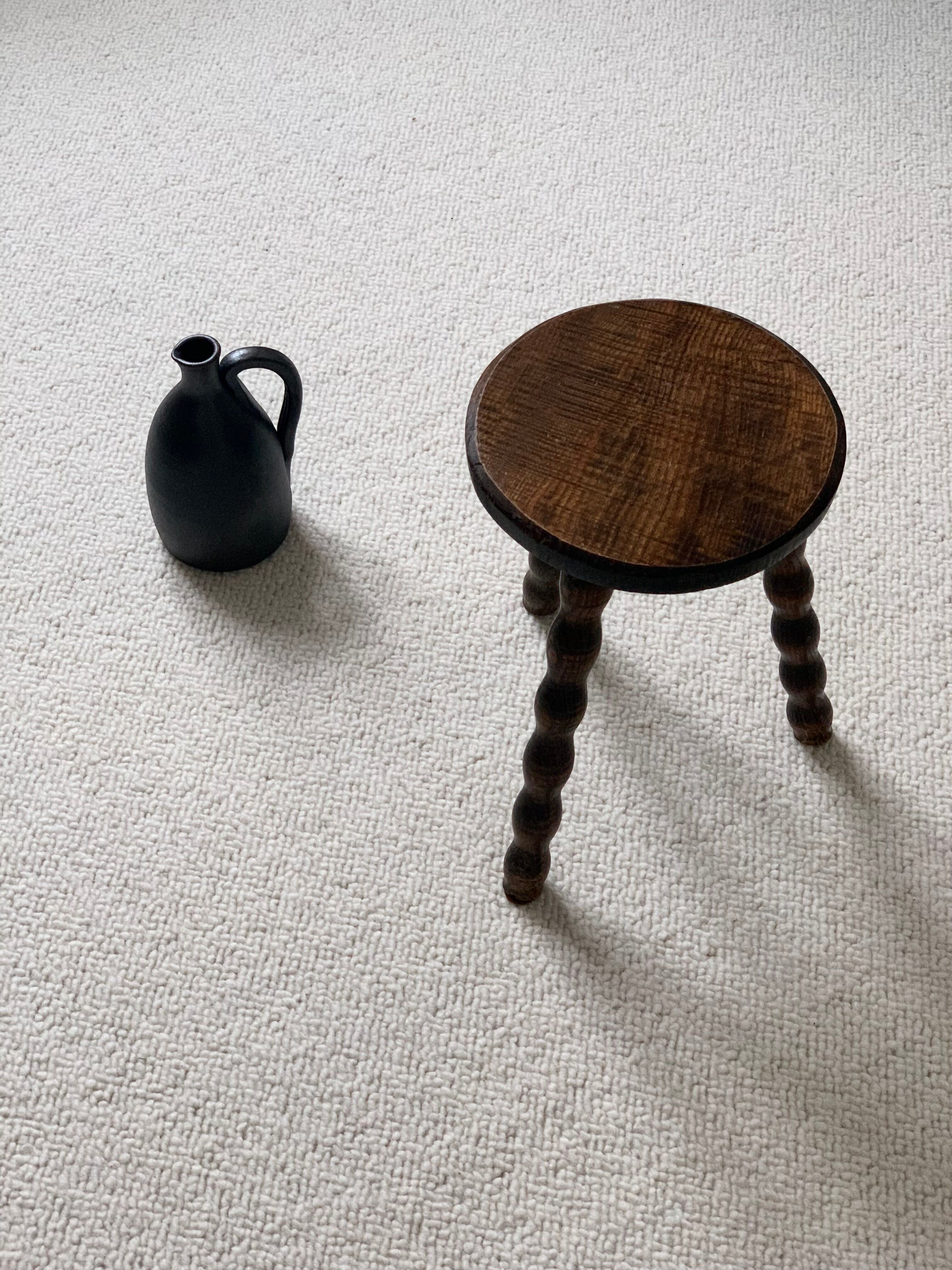 Wooden tripod stool