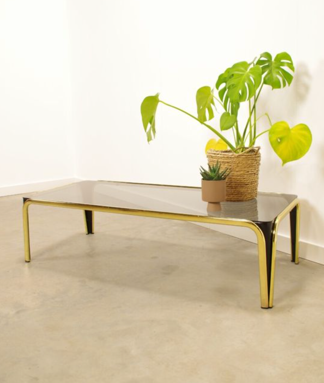 Vintage coffee table in brass and smoked glass
