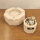 Travertine ashtray and lighter, design by Cerri Nestore, 1970.