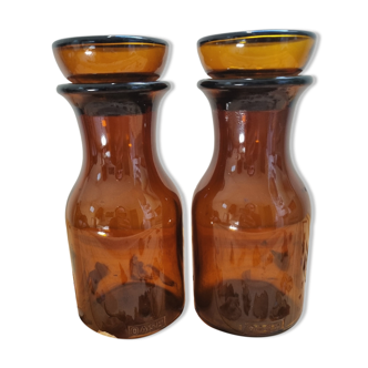 Pair of vintage Dash apothecary bottles