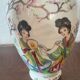 Japanese porcelain vase decorated with 2 geishas and flowering trees