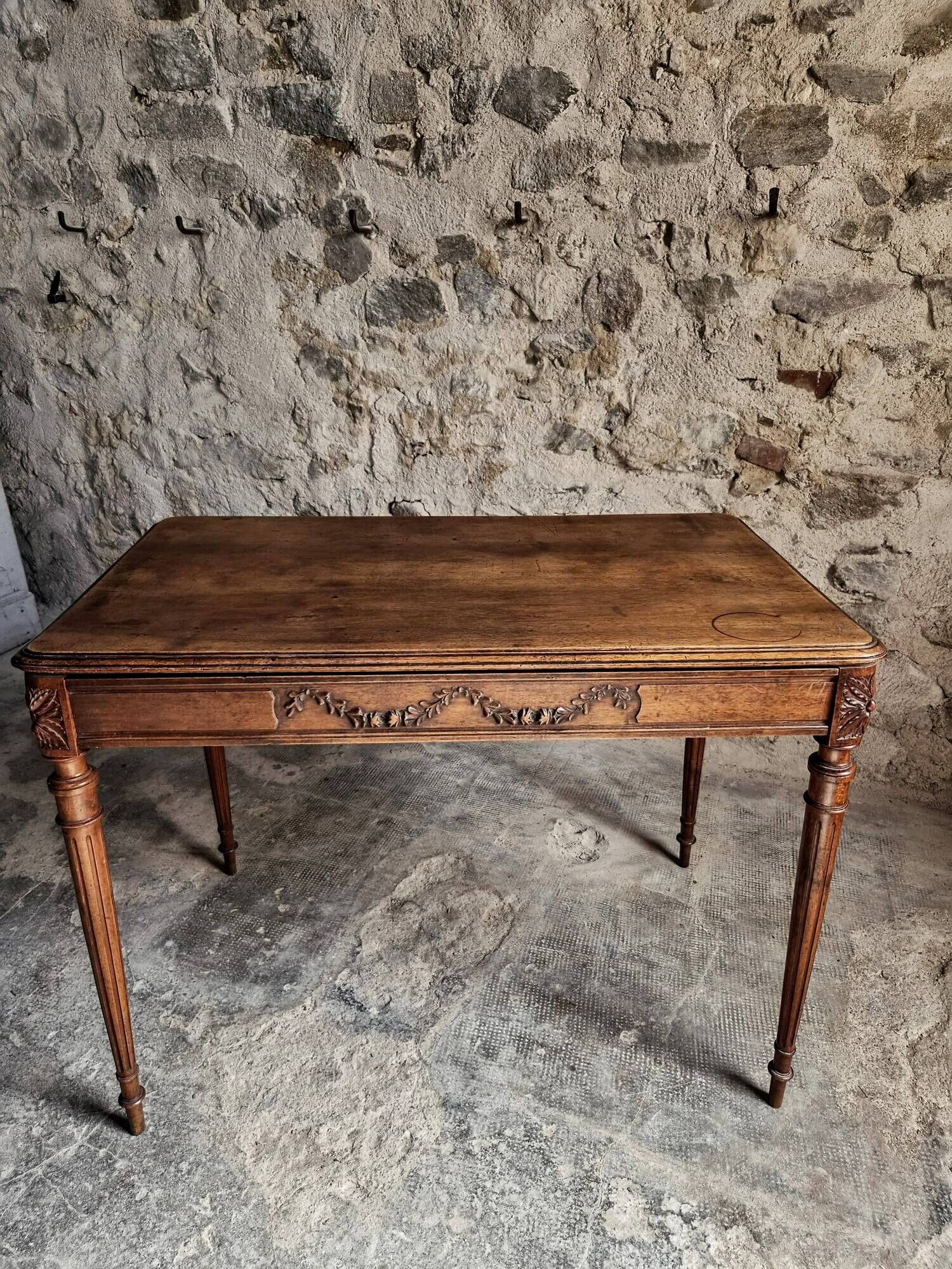 French antique writing desk in walnut, Louis XVI style, late 19th century, circa 1880–1900.