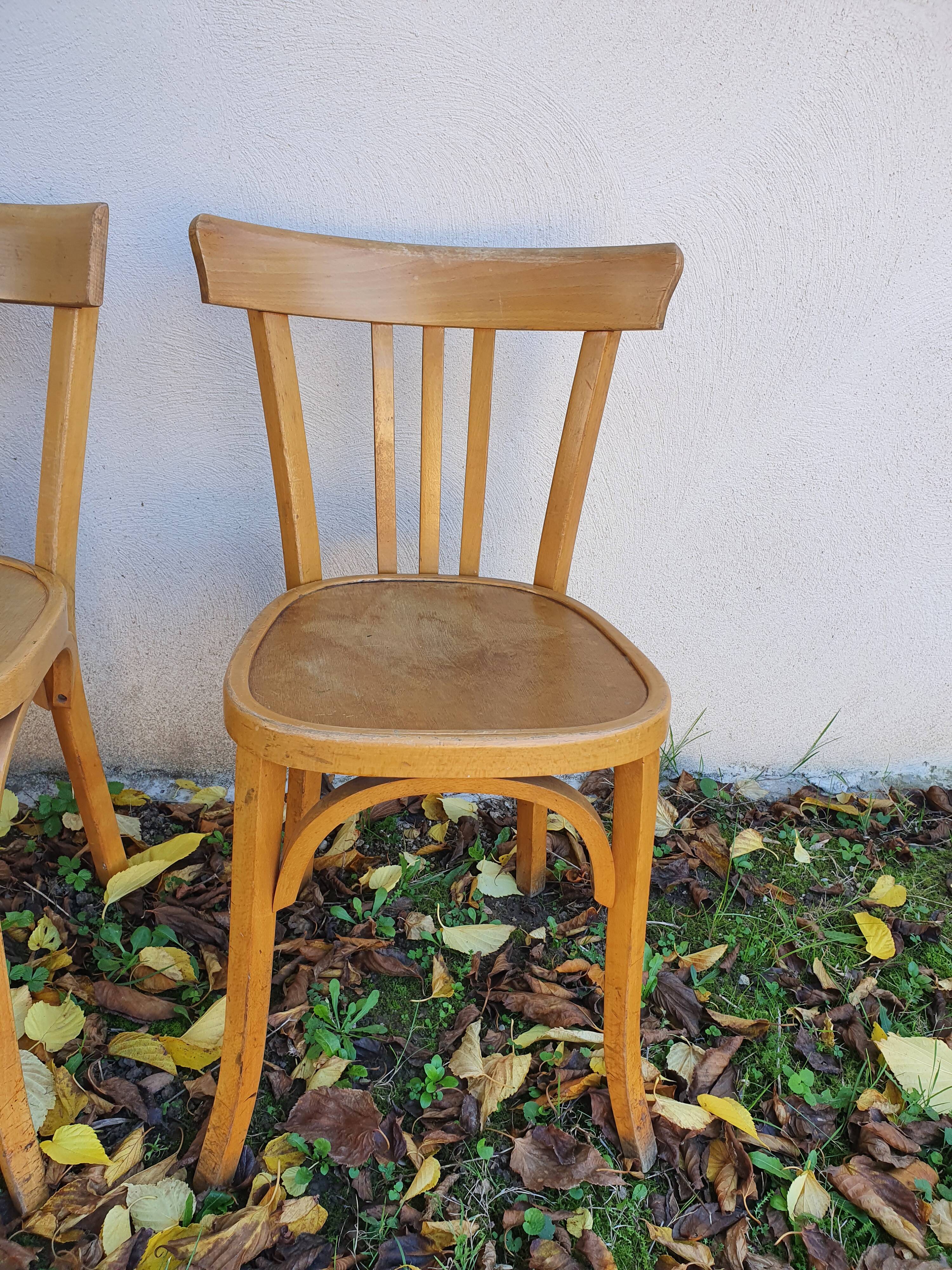 4 bistro chairs stamped Baumann