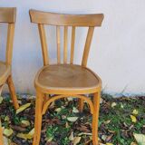 4 chaises de bistrot dont estampillée Baumann
