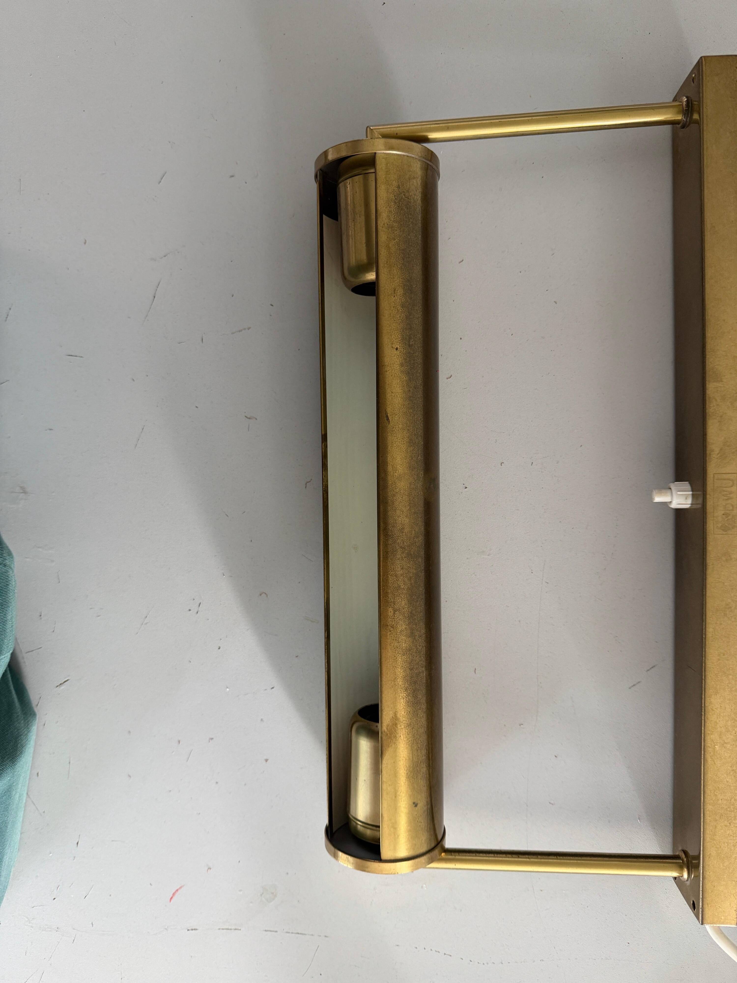 Pair of brass wall lights with adjustable heads from the mid-20th century, 1960, Germany.