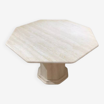 Octagonal table in light travertine