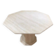 Octagonal table in light travertine