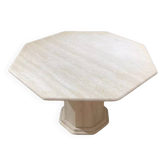 Octagonal table in light travertine