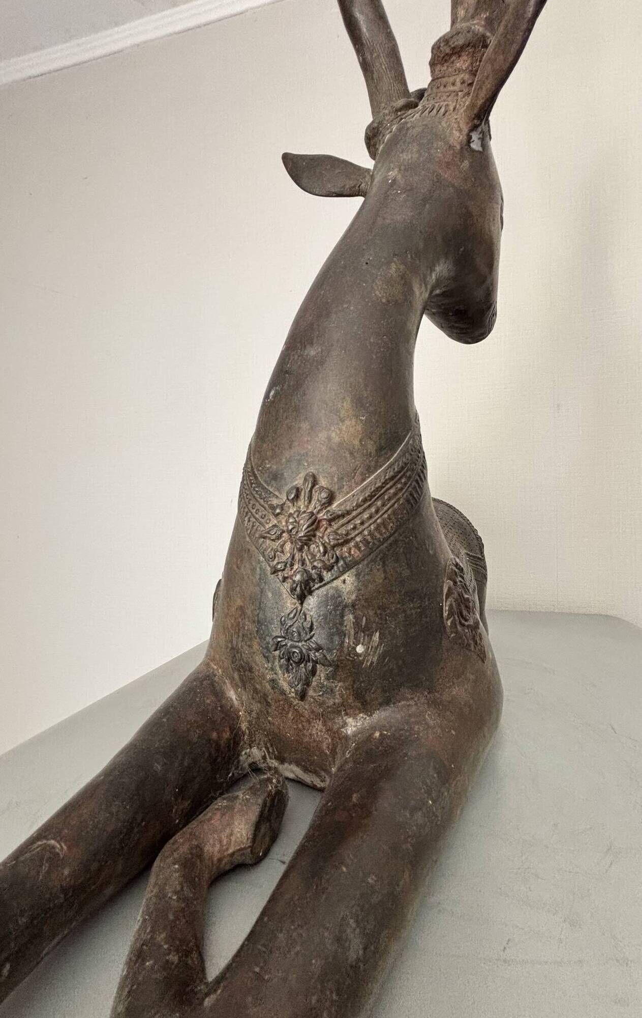 Solid bronze deer 20kg (1979), with period sales certificate.