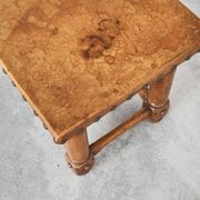 Brutalist coffee table in solid oak, metal, and patinated leather, 1940s.