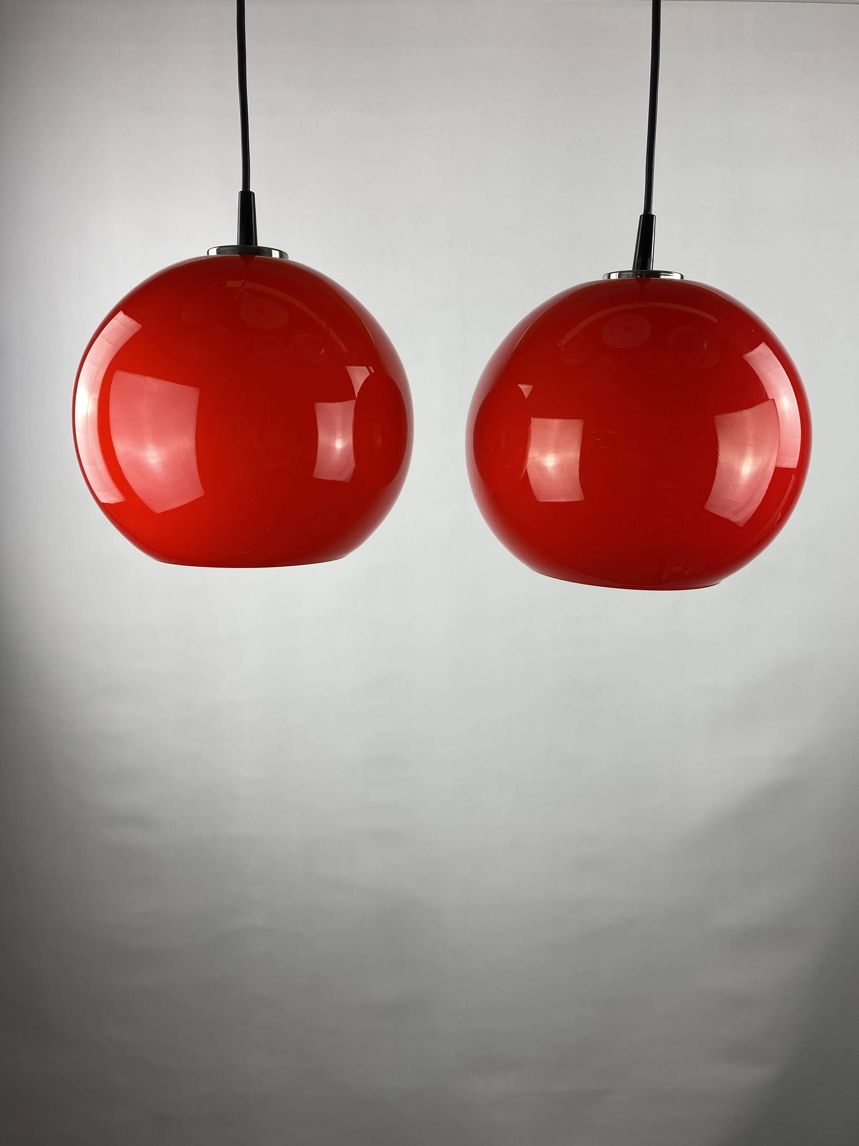 Pair of two cherry glass pendants by Peill & Putzler